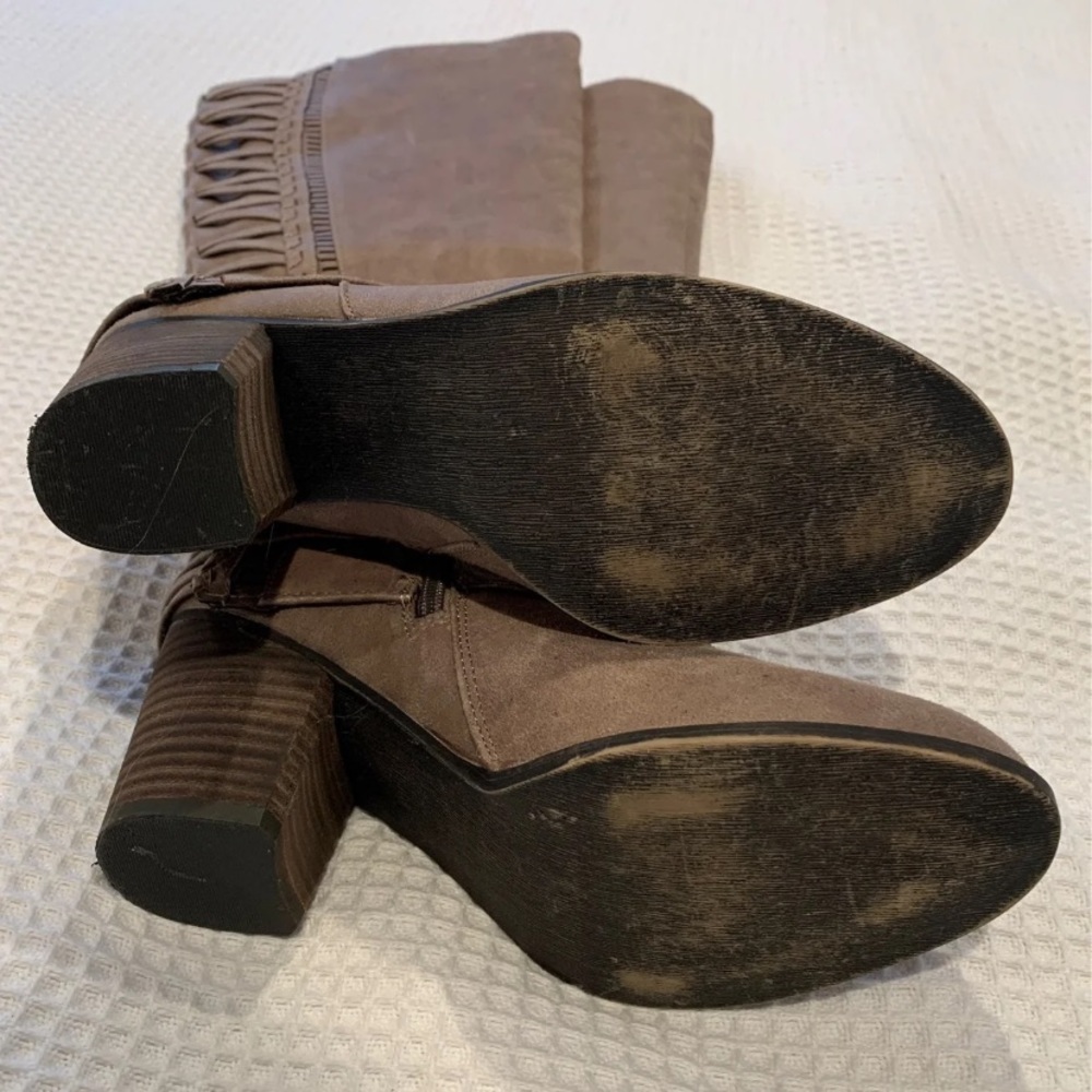 Tall gray heeled boots